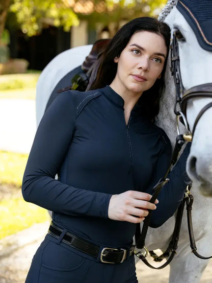 LeMieux Brilliance Navy Lightweight Base Layer on woman with horse | Equestrian Performance Top