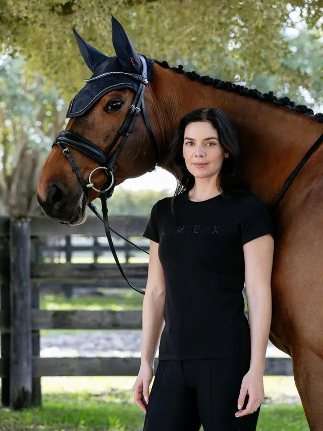 LeMieux Brilliance T-Shirt Black on woman posing with horse | Equestrian riding apparel