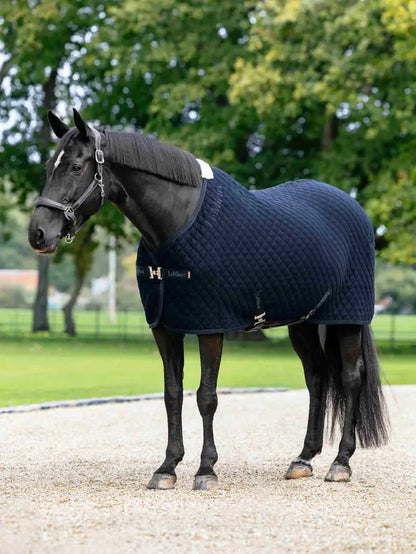 LeMieux Arika Clima-Tek Rug Navy: Moisture-wicking cooling rug for horses post-exercise.
