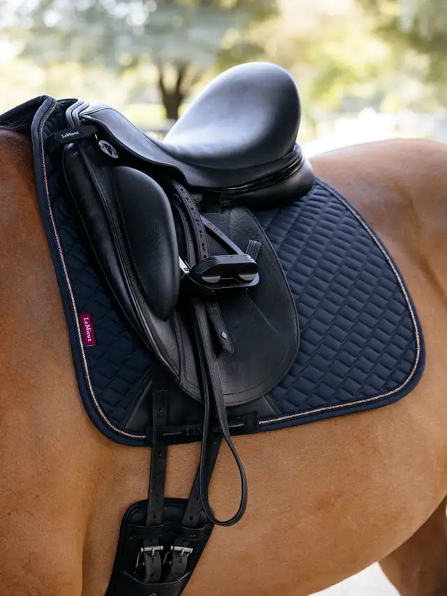 LeMieux Brilliance Dressage Square Navy horse saddle pad with sparkle detailing for competition.