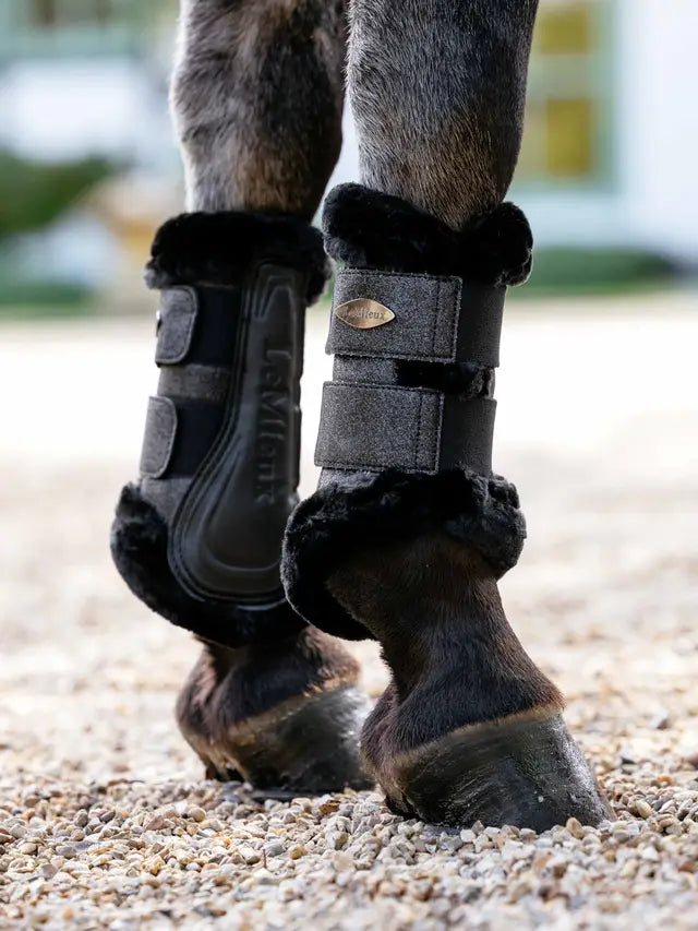 LeMieux Brilliance Fleece Edged Brushing Boots in Black for horse leg protection.