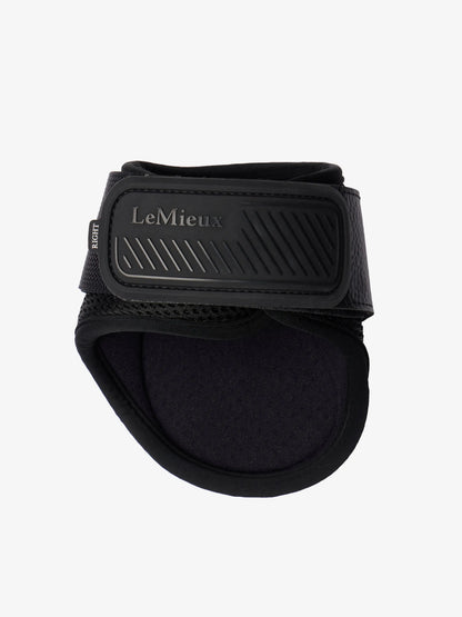 LeMieux black compliant fetlock boots for horses - durable, protective, and cooling.