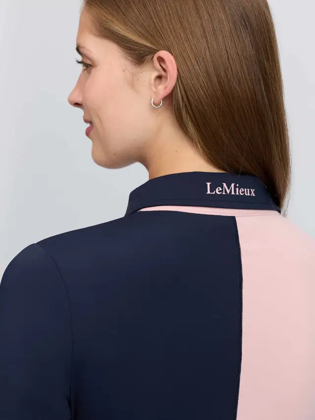 LeMieux Harlequin Rugby Shirt Base Layer Petal/Navy - close-up of collar and shoulders.
