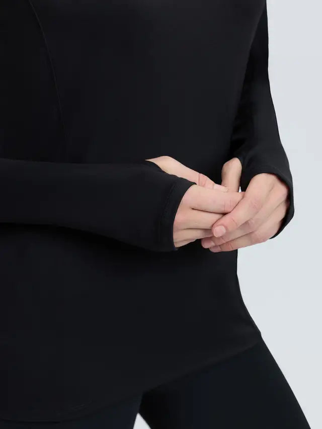 LeMieux Heidi hooded mid layer black training top with thumbholes for women.