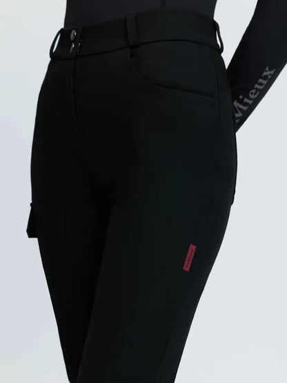 LeMieux Stormwear black waterproof stretch trousers for equestrians with cargo pocket.