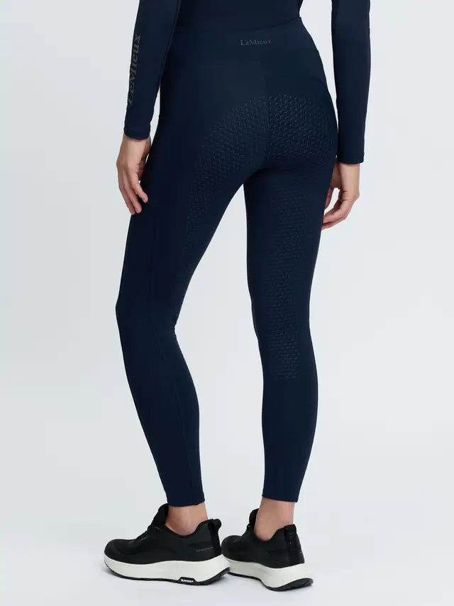 LeMieux navy blue thermal riding leggings with silicone full seat grip – back view