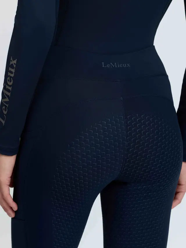 LeMieux women's navy thermal riding leggings with textured silicone full seat grip