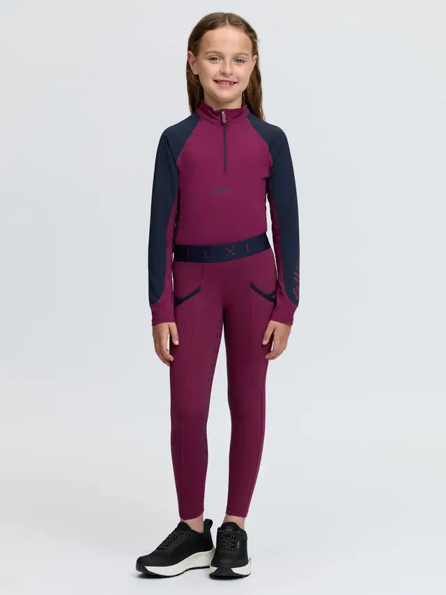 LeMieux Mini Pull On Riding Breeches for girls in blackberry, featuring technical fabric and silicone grip seat.