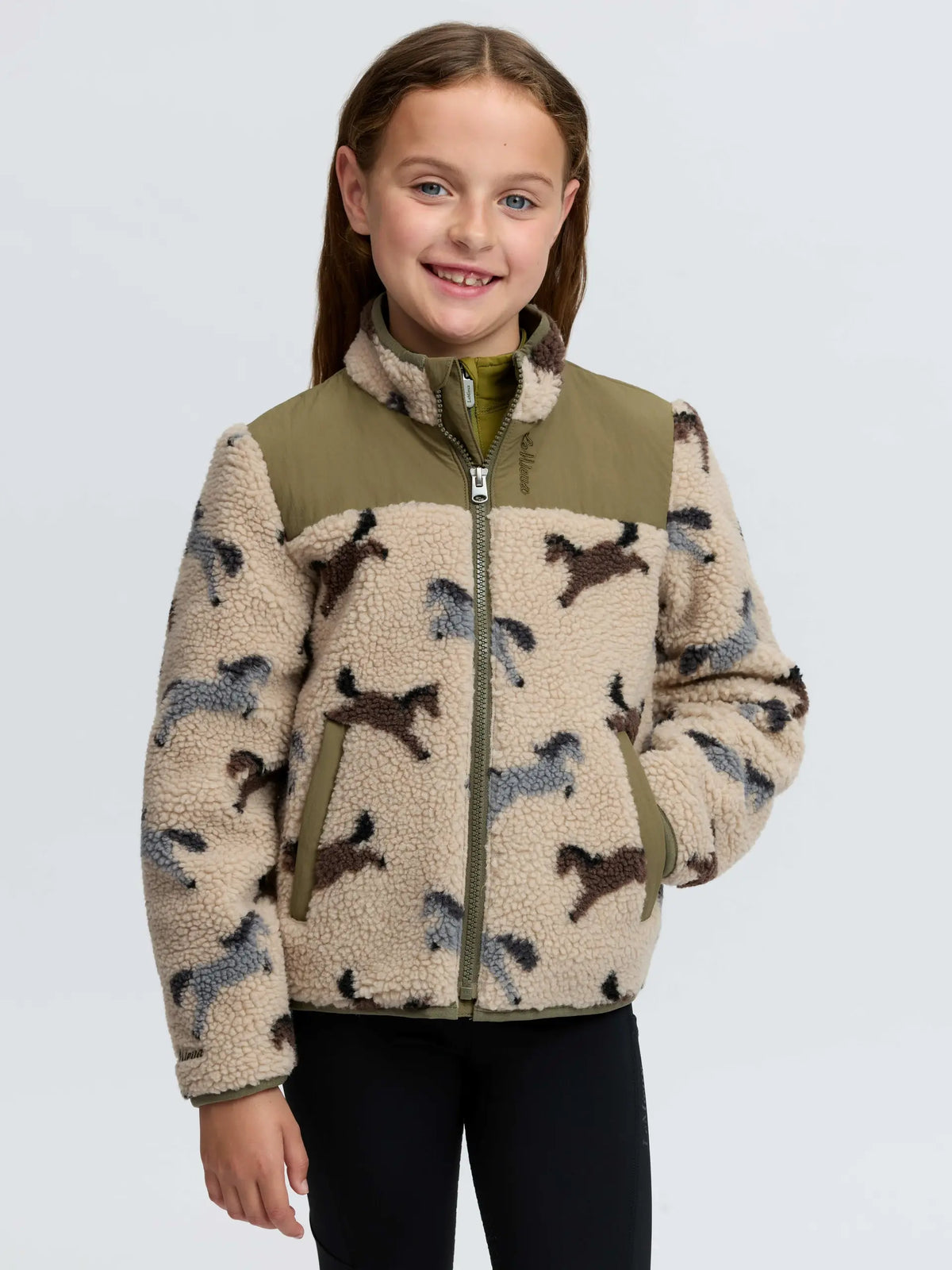 Girl's LeMieux pony print fleece jacket in Willow Green, perfect for outdoor play.