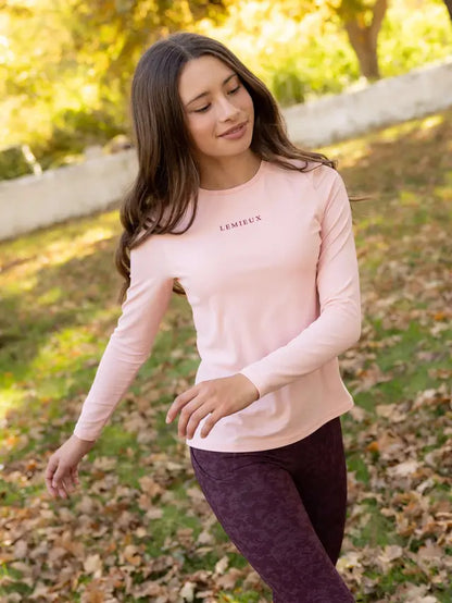 Lemieux Young Rider Hybrid Sports Top in Petal Pink: Comfortable and stylish activewear for equestrian girls.