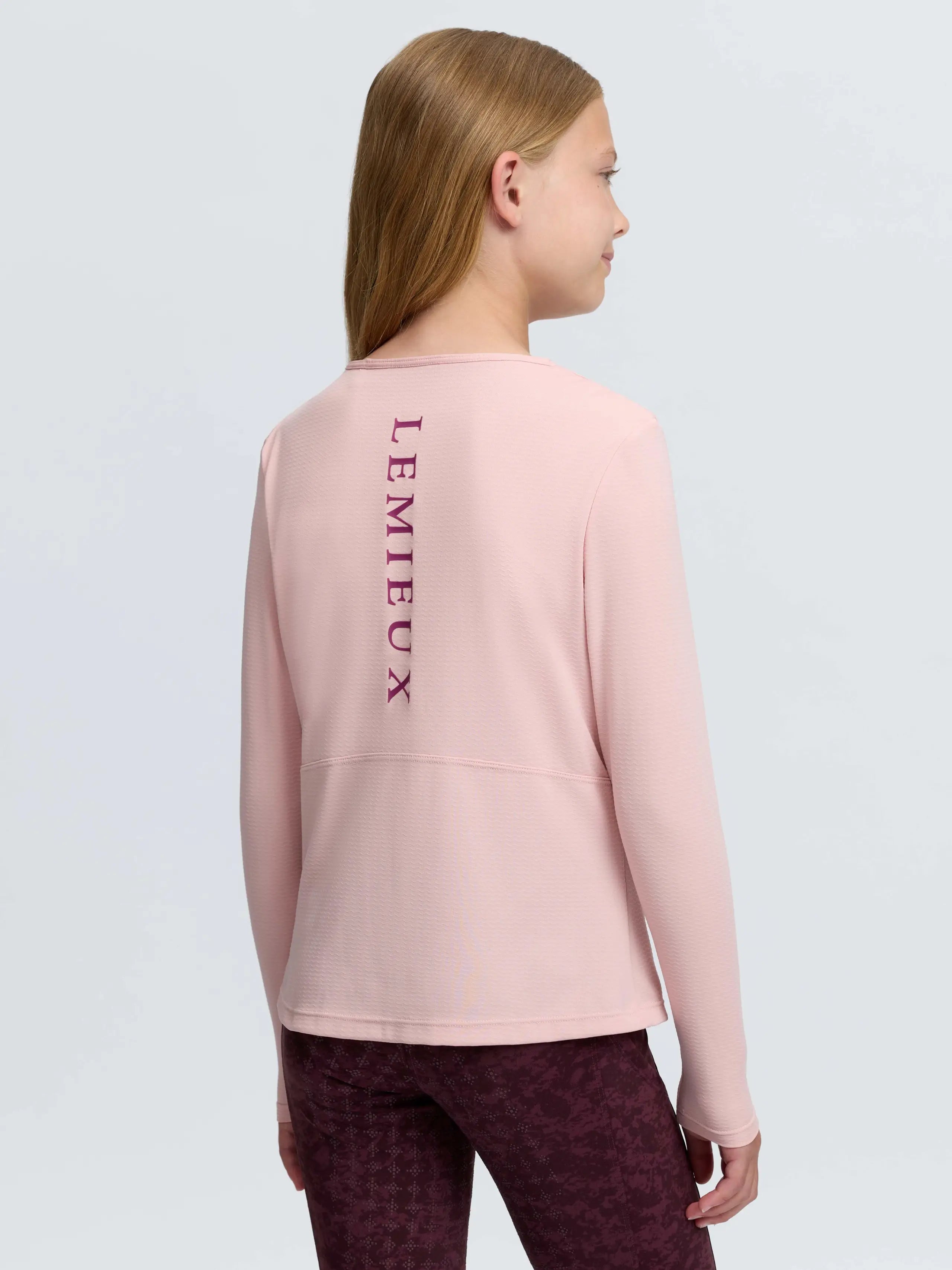 LEMIEX Young Rider Pink Petal long sleeve hybrid sports top with built-in bralette for comfort.