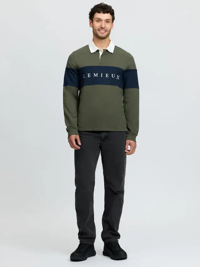 LeMieux Mens Rugby Shirt Olive, long sleeve, classic design, paired with dark grey jeans.