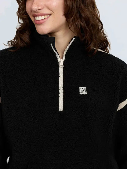 Lemieux Avery Teddy Quarter Zip Fleece Black with LM logo and cream trim