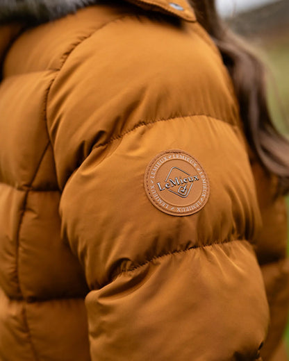 LeMieux Harper Longline Puffer Jacket in Ginger - Close-up with Brand Patch Detail
