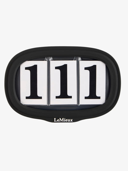 LeMieux black saddle number holder with "111" for equestrian competitions
