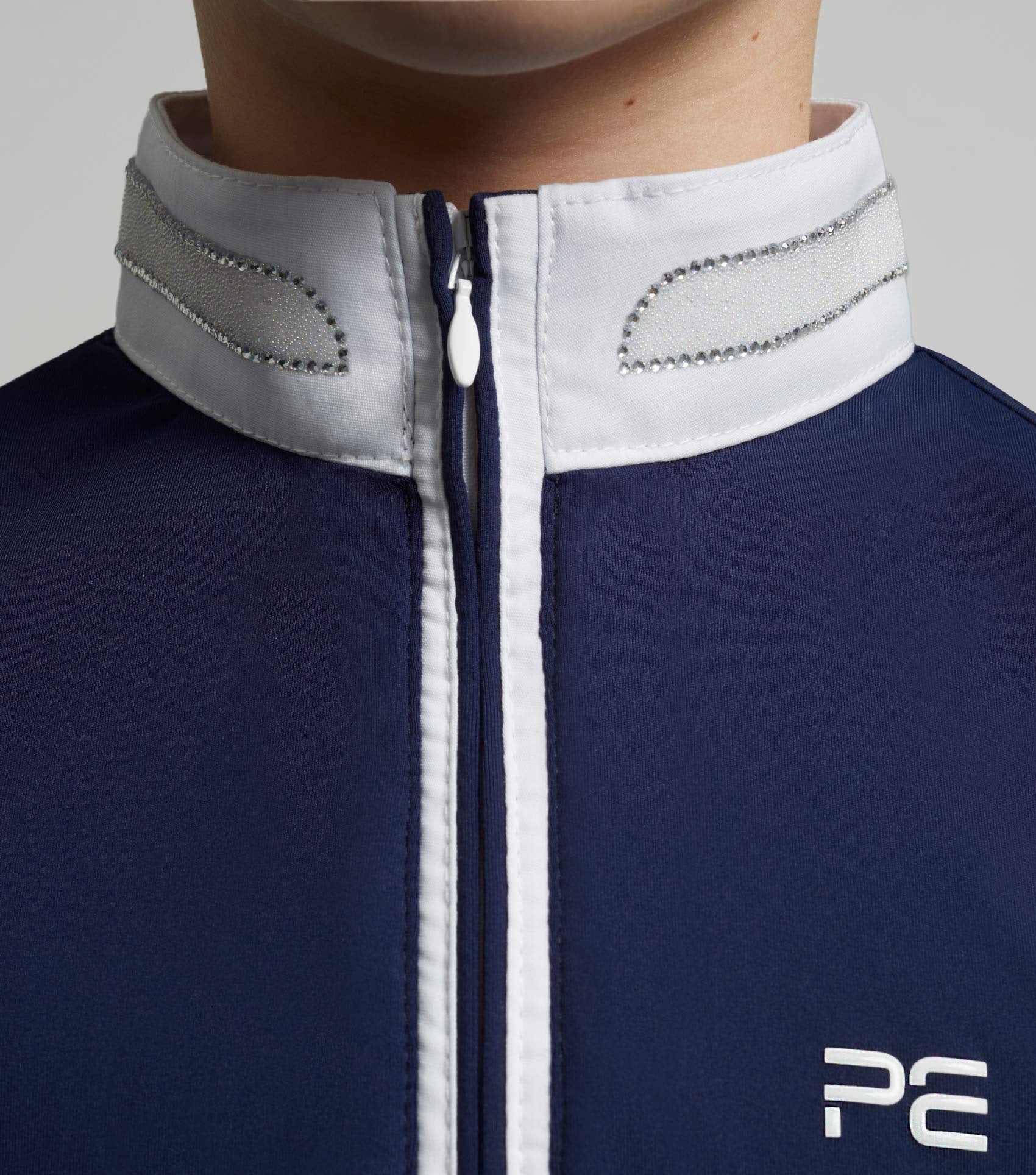 Premier Equine Maria Girls Diamanté Navy Show Shirt: Close-up of collar and zipper. Buy Now at Equiflair!