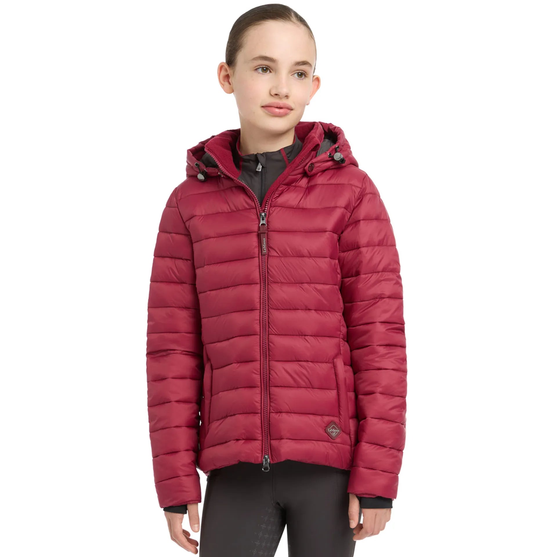 Girl in LeMieux Young Rider Milly Puffer Jacket Ember - Water Resistant, Lightweight