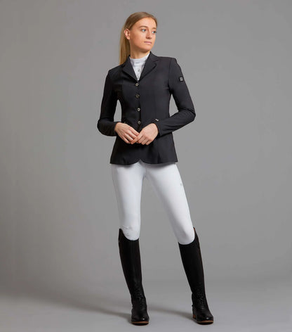 Woman in Black Premier Equine Nera Riding Jacket & White Breeches, Equiflair