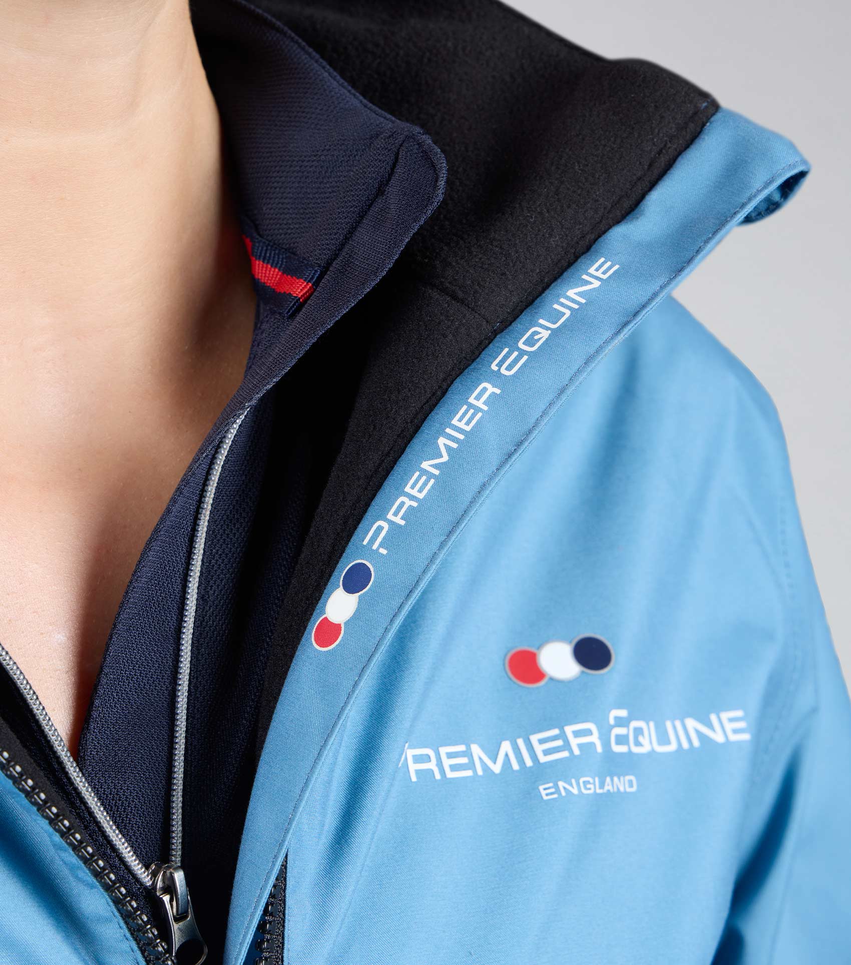 Premier Equine Omnia Women's Waterproof Riding Jacket Azure Blue - equestrian apparel close-up