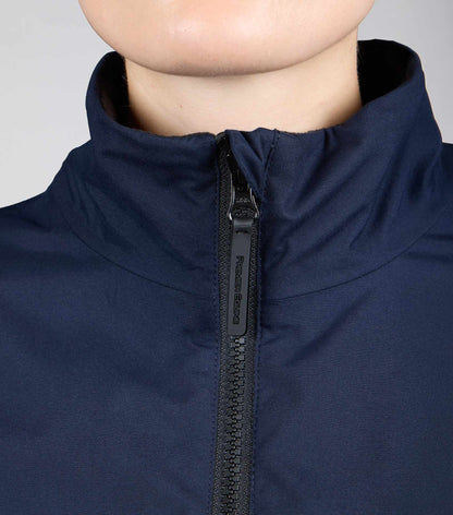 Close up: Premier Equine Navy Waterproof Riding Jacket. Equestrian Sportswear, Premier Equine Jacket, Navy Jacket.
