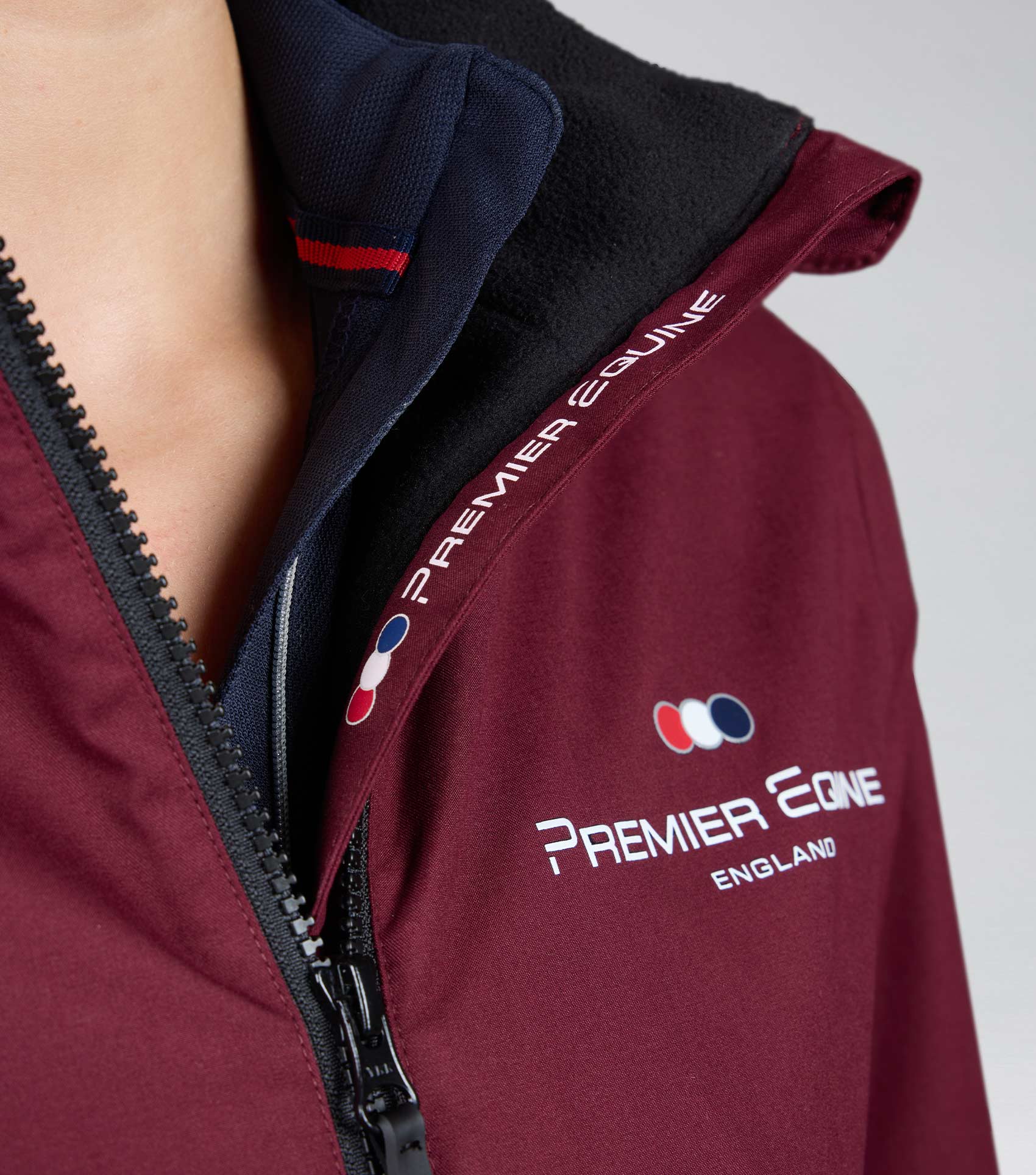 Premier Equine Omnia Women's Waterproof Riding Jacket - Wine Color, Zipper Detail, Collar - High-Performance Equestrian Apparel