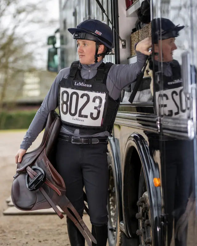 Equestrian Rider with Saddle in LeMieux Gear - Equiflair's Slate Grey Base Layer #EquestrianStyle #HorseRiding