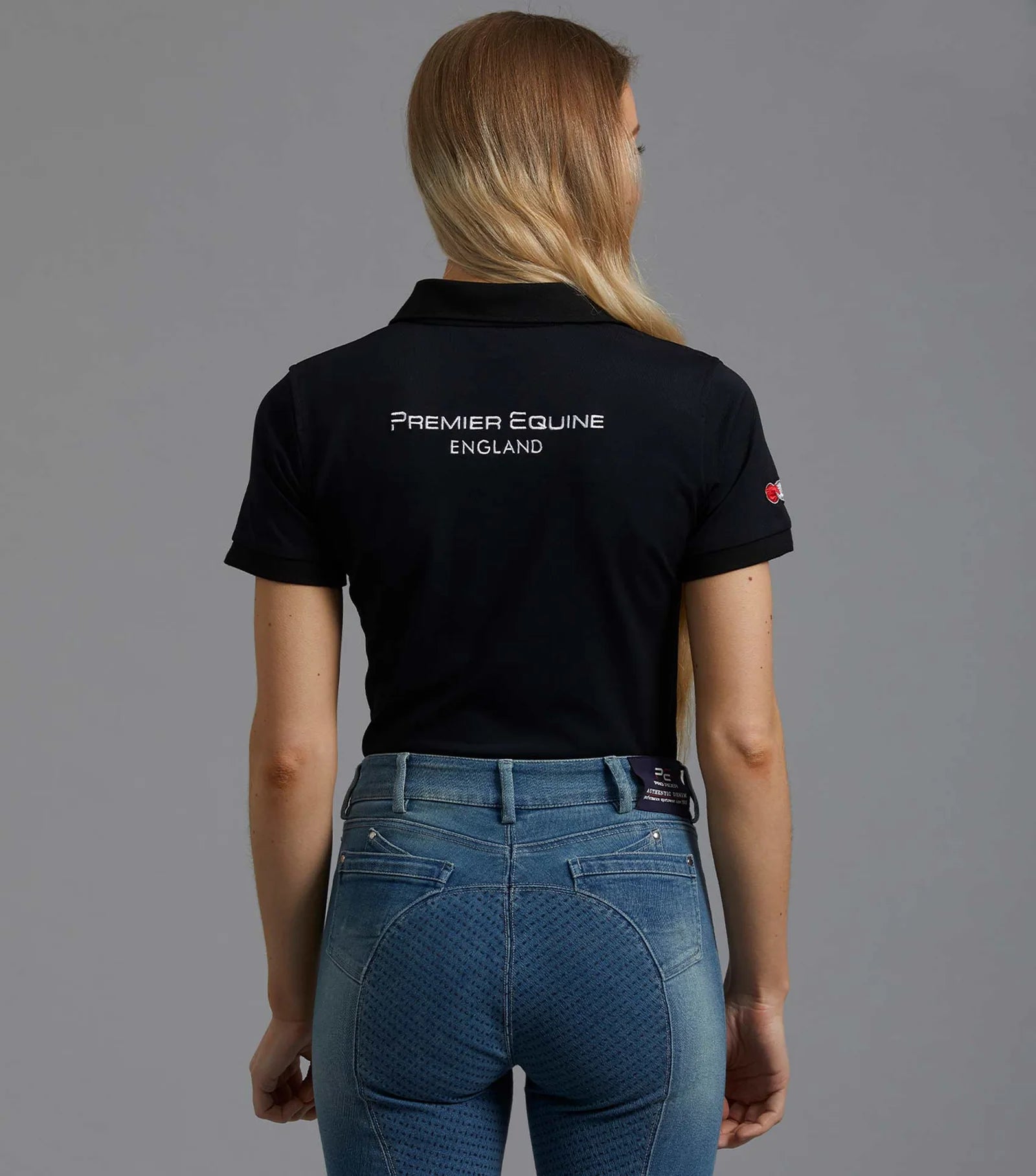 Premier Equine Ladies Black Polo Shirt. Equestrian Team Polo Top, Back View, Riding Apparel.