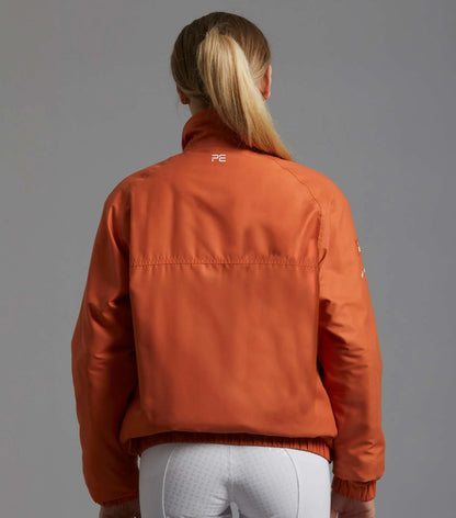Premier Equine Pro Rider Waterproof Riding Jacket Burnt Orange. Unisex equestrian coat, horse riding apparel. Equiflair.