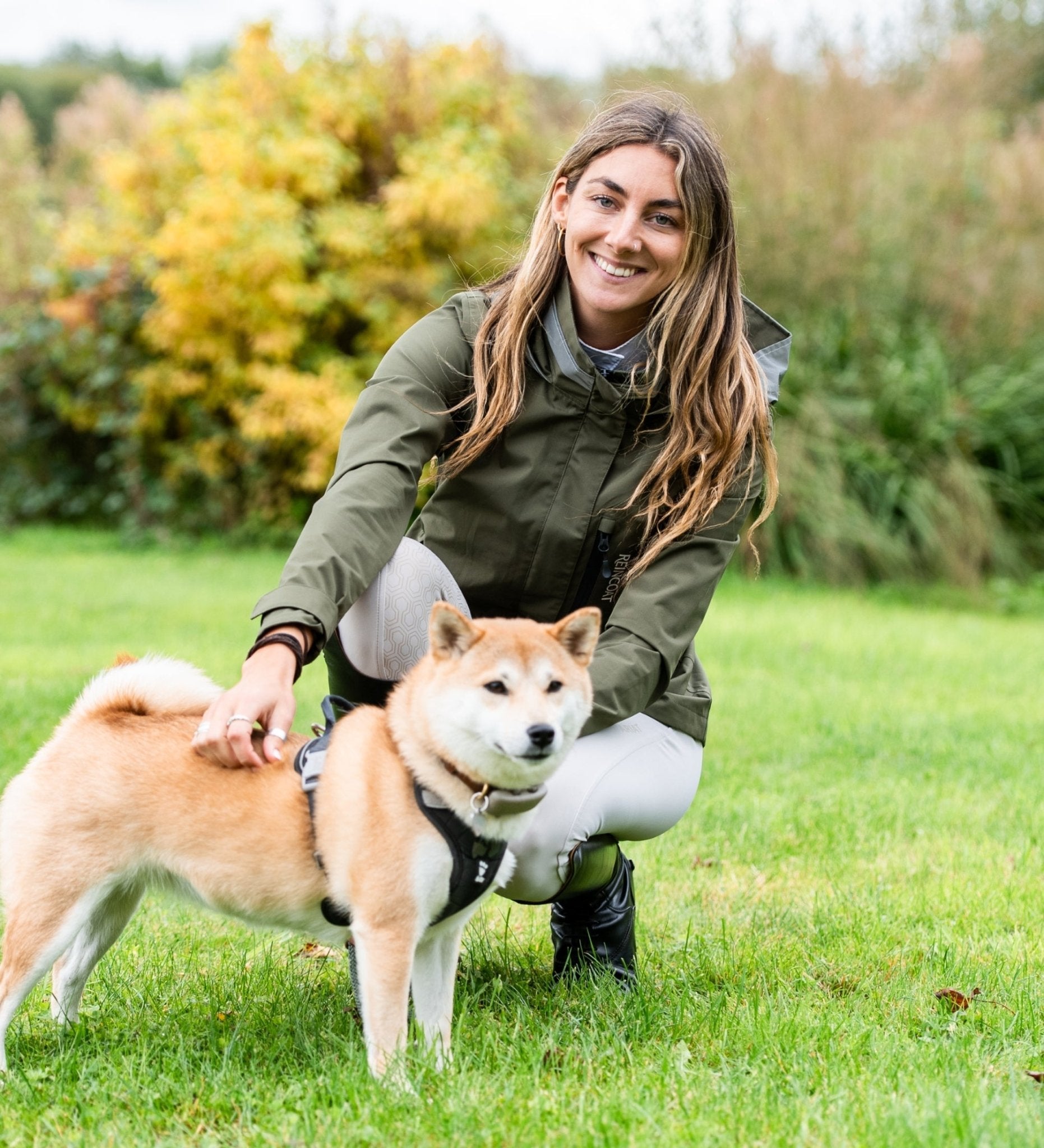 Woman with Shiba Inu in Reincoat Air Olive Waterproof Jacket - Equiflair Outdoor Apparel
