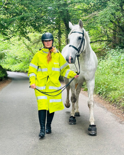 Equiflair: Hi-Vis Yellow Reincoat for Horse Riding - Woman with Horse