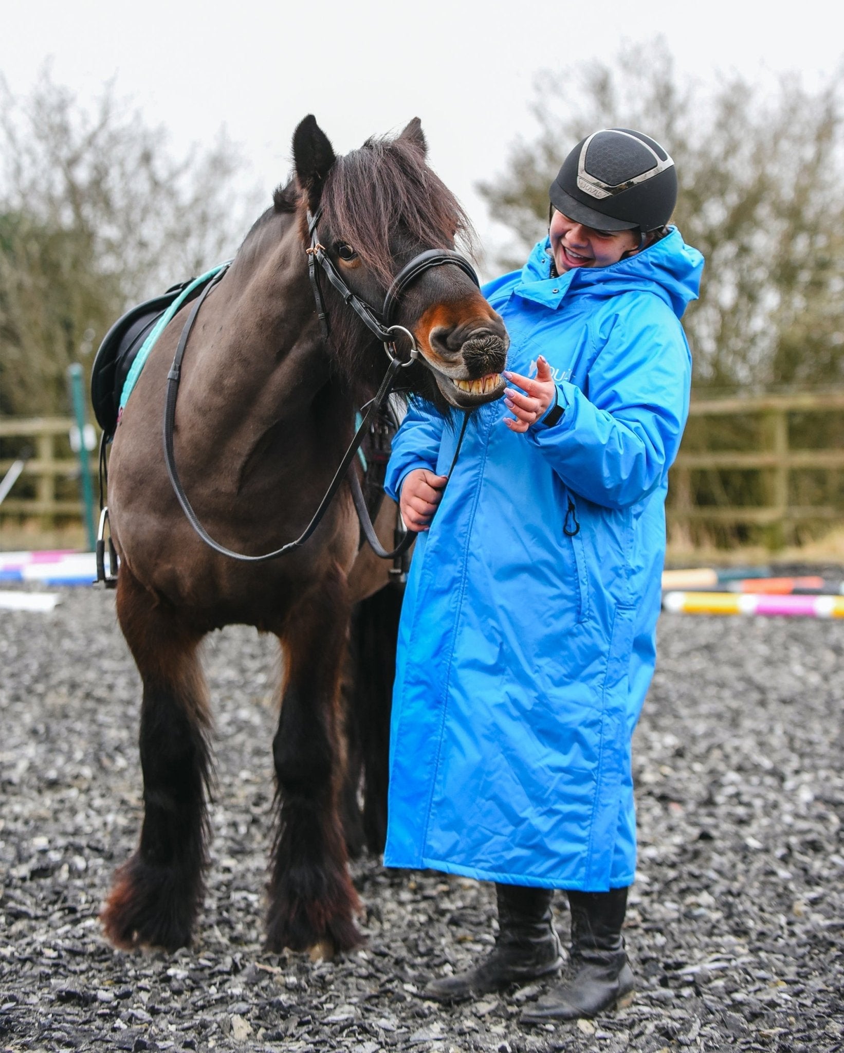 Reincoat Original Adult - Blue: Waterproof Horse Riding Raincoat by Equiflair - Horse and Rider