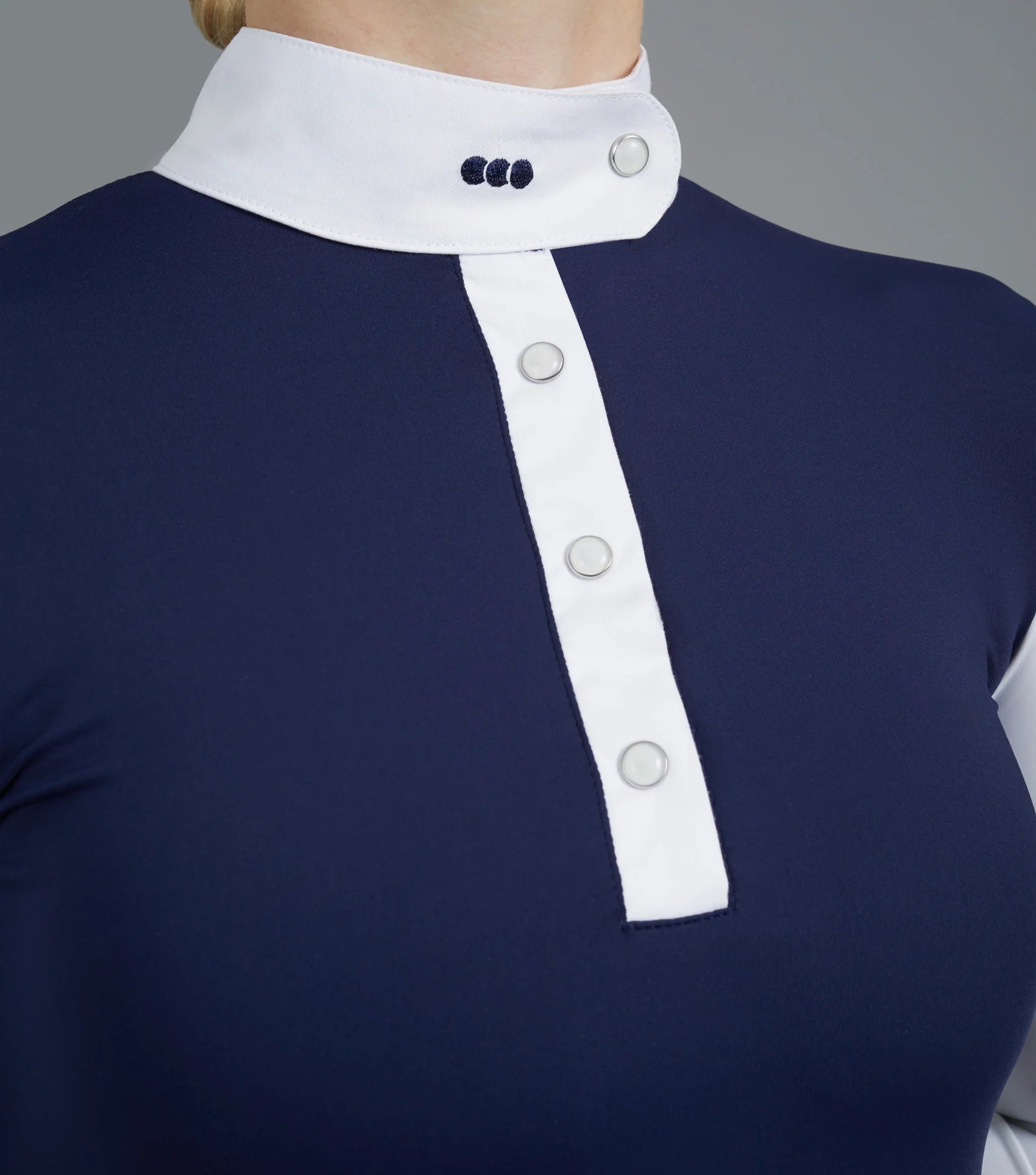 PREMIER EQUINE: Navy and White Equestrian Show Shirt - Close-up of stylish competition wear with white collar and button detailing.