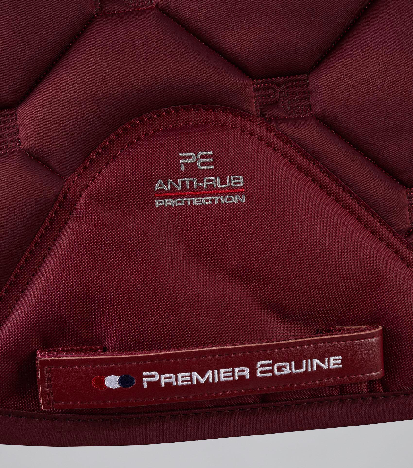 Premier Equine Saltare Close Contact GP/Jump Square Saddle Pad in Wine Color