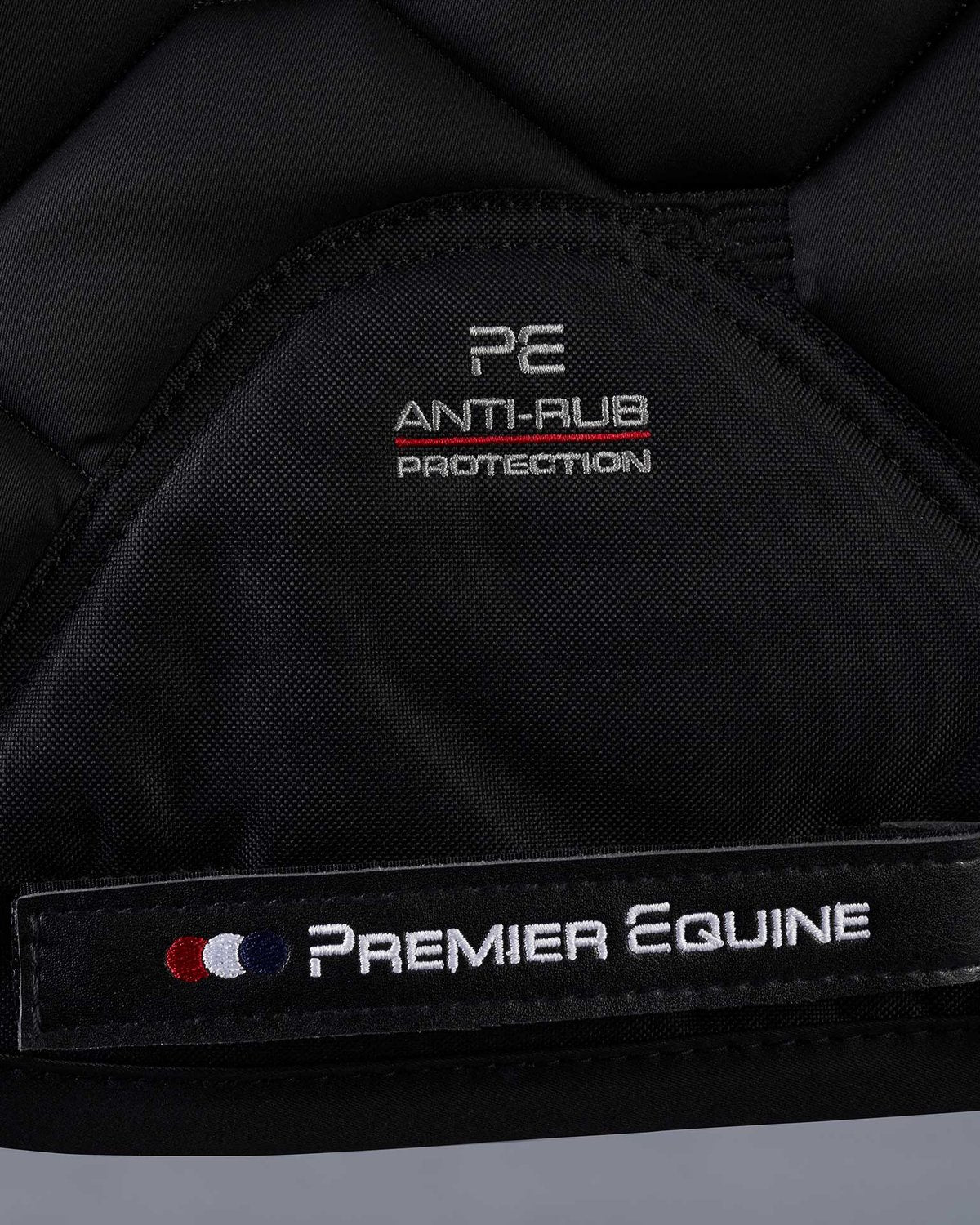 Premier Equine Saltare Black Dressage Saddle Pad - Close Contact, Anti-Rub Protection