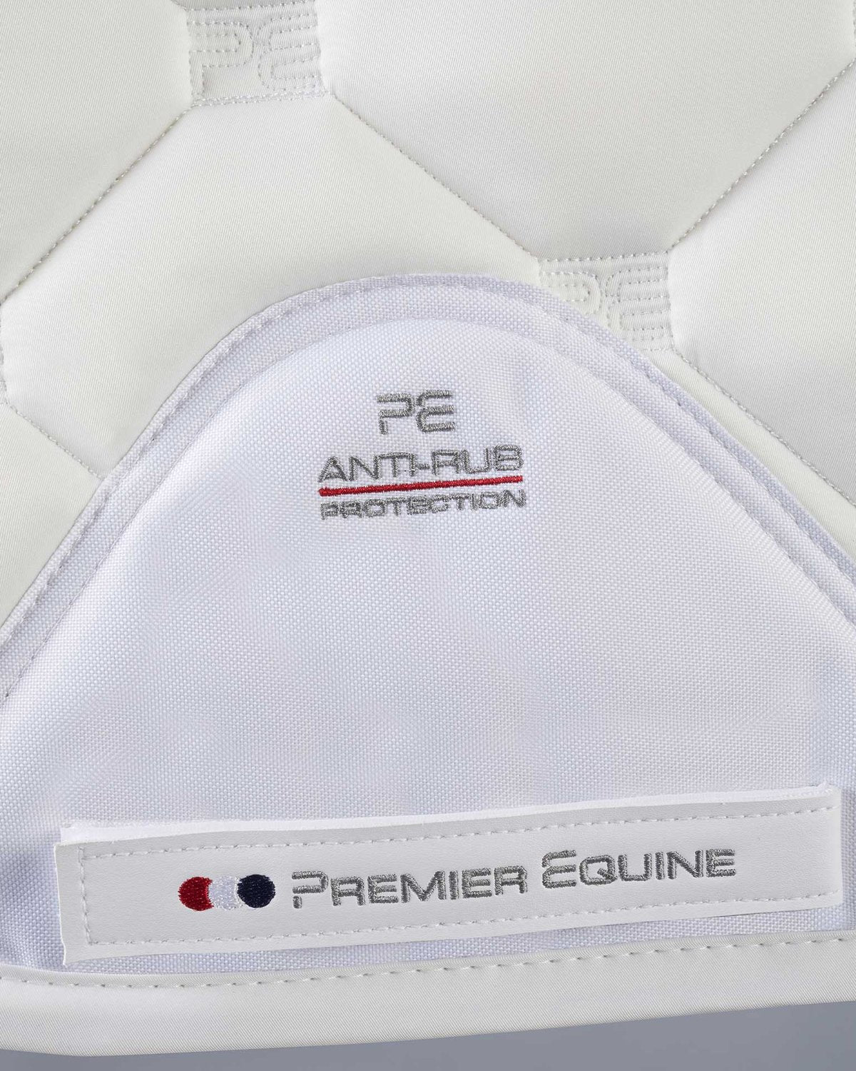 Premier Equine Saltare Close Contact Dressage Square White Saddle Pad with Anti-Rub Protection Detail