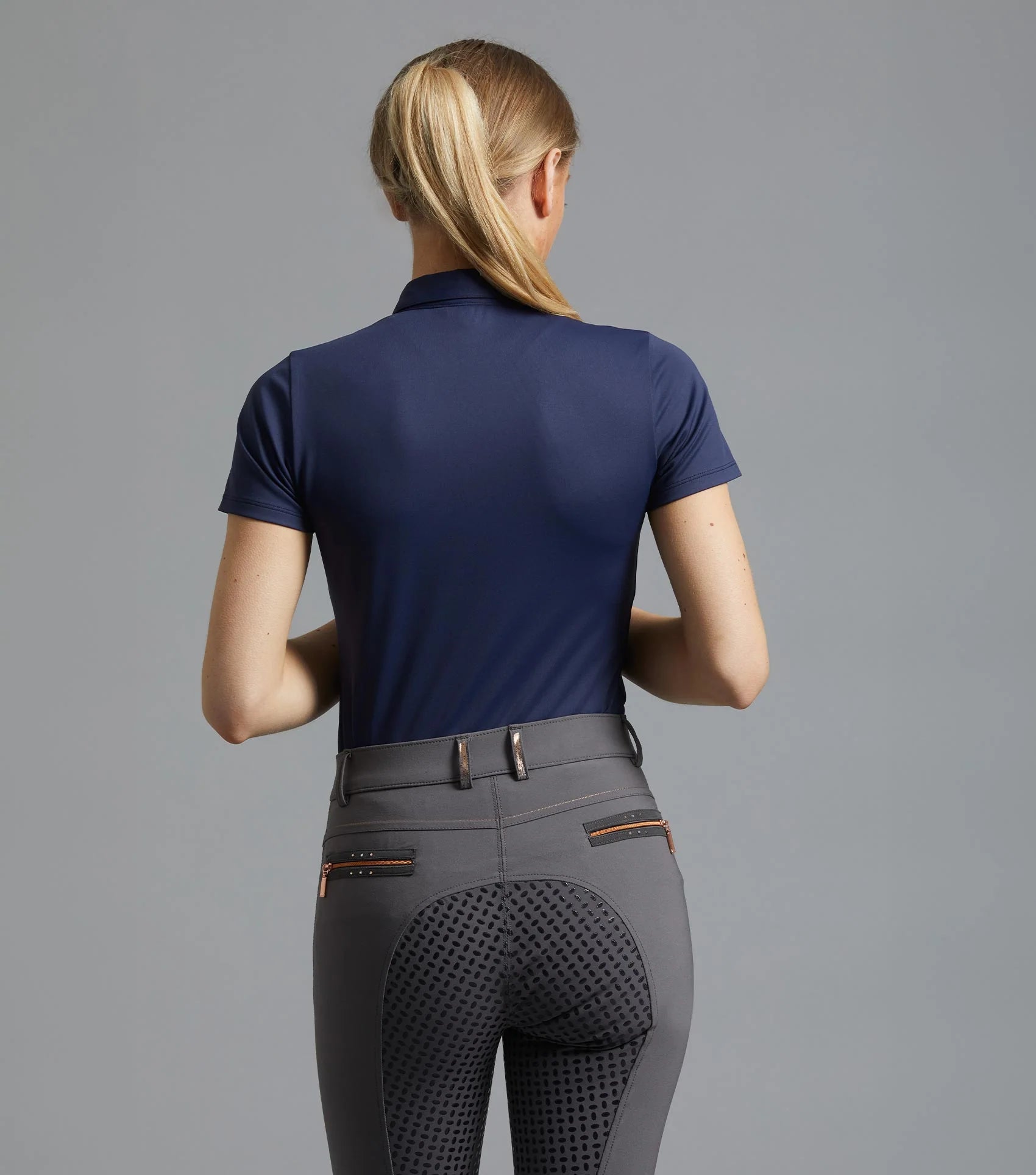 Premier Equine Navy Riding Top. Ladies equestrian shirt, short sleeve, moisture wicking, four-way stretch. Equiflair retailer.