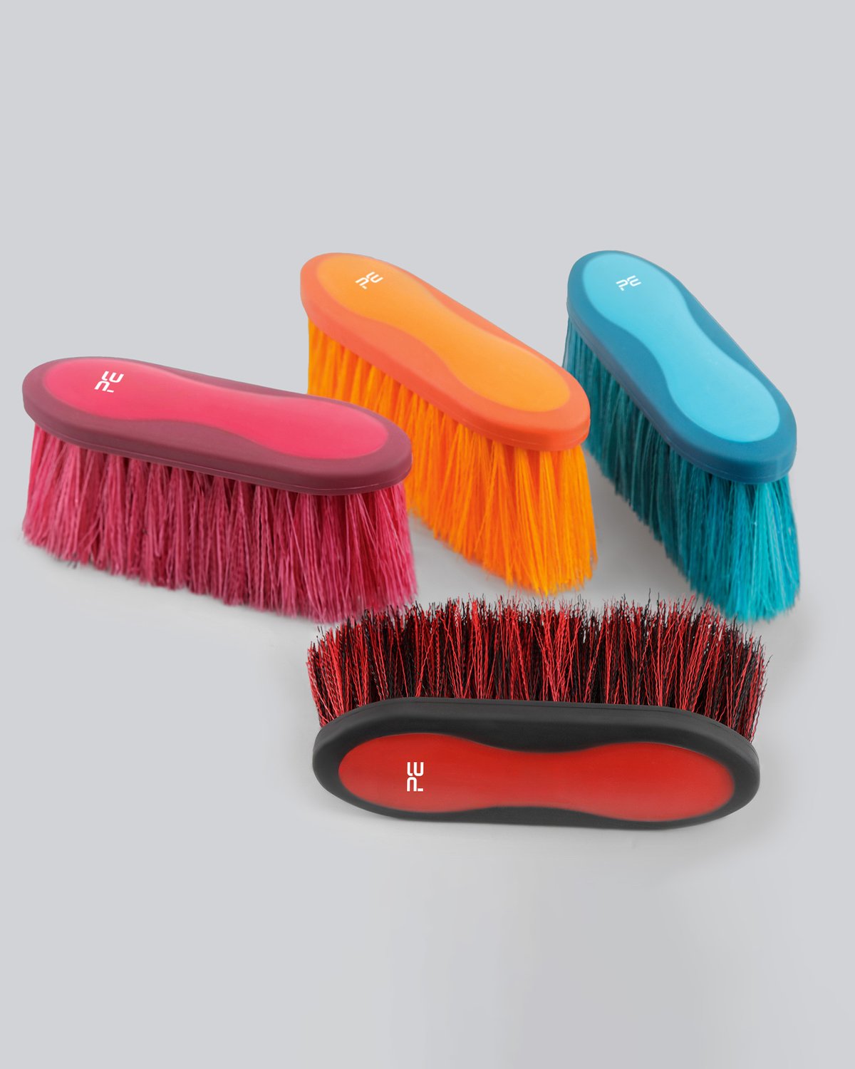 Premier Equine Dandy Brushes: Soft Touch grooming brushes, long bristles in pink, orange, blue, black and red colors.
