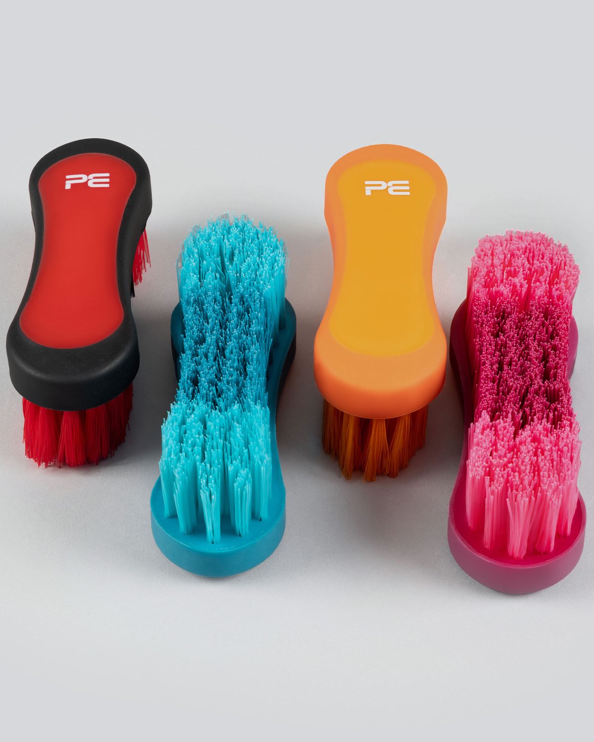 Premier Equine Soft-Touch Face Brushes: Red/Black, Blue, Orange, Pink grooming brushes.