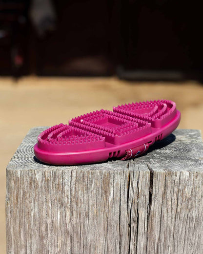Premier Equine Flexi Curry Comb - Fuchsia Horse Grooming Tool on Wood