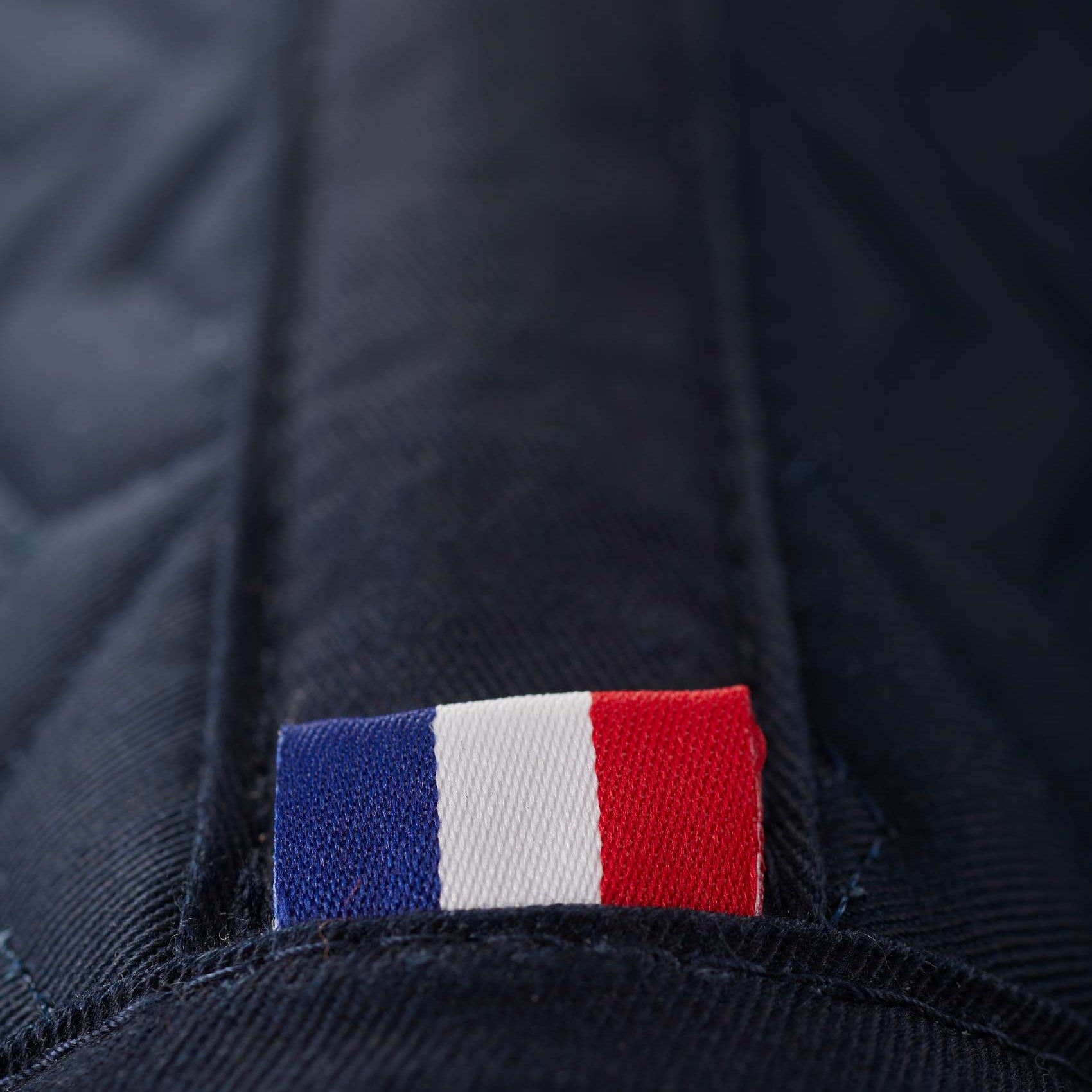 Premier Equine navy dressage square saddle pad with French flag detail - equestrian apparel.