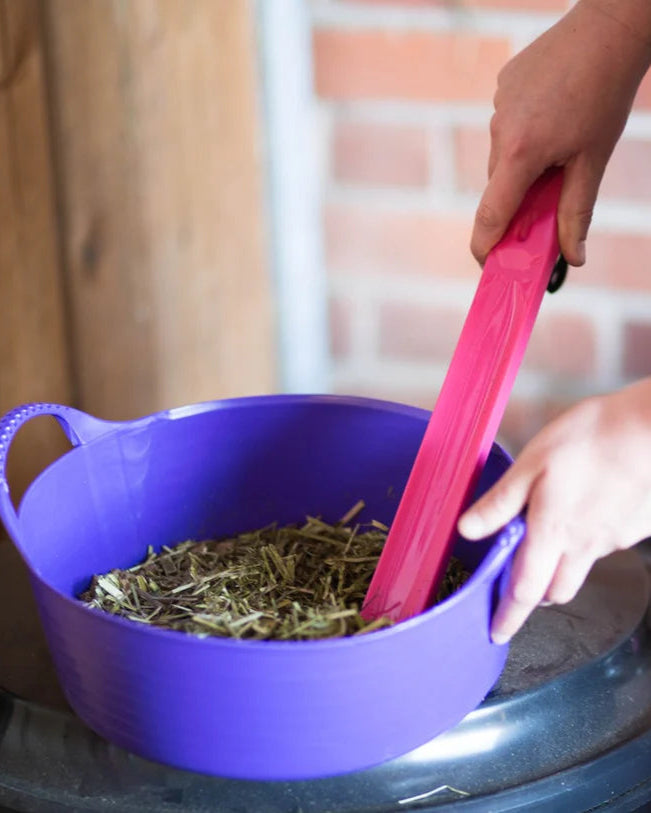 Red Gorilla Stir Up Pink Tool from Equiflair mixing food. Versatile tool for stable, building, and home use, easy to clean