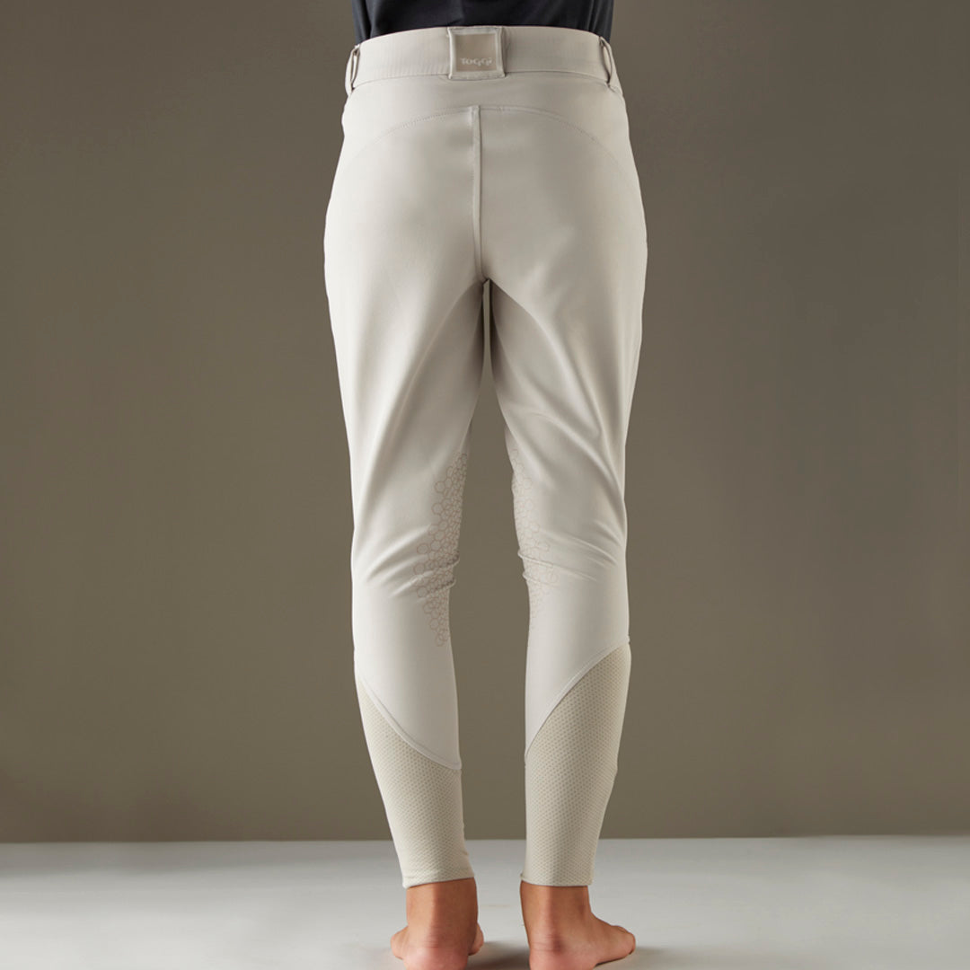 Back view of beige TOGGI children's contour breeches with silicone knee grip and mesh ankle.