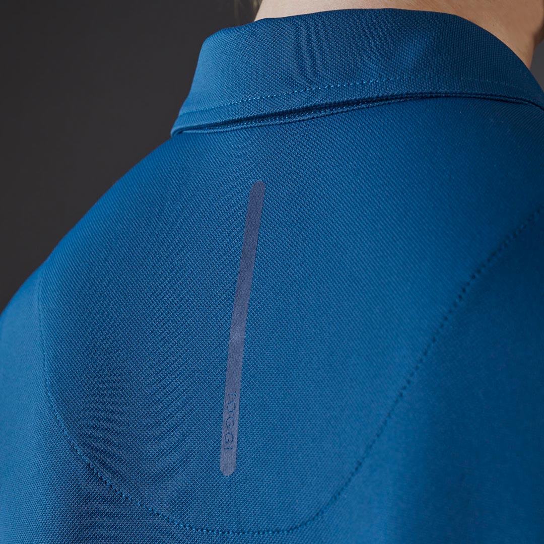 Toggi blue polo shirt back with reflective branding and UPF 50+