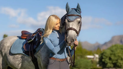 LeMieux Ice Blue Fly Hood on Horse with Blonde Equestrian Rider | Equiflair