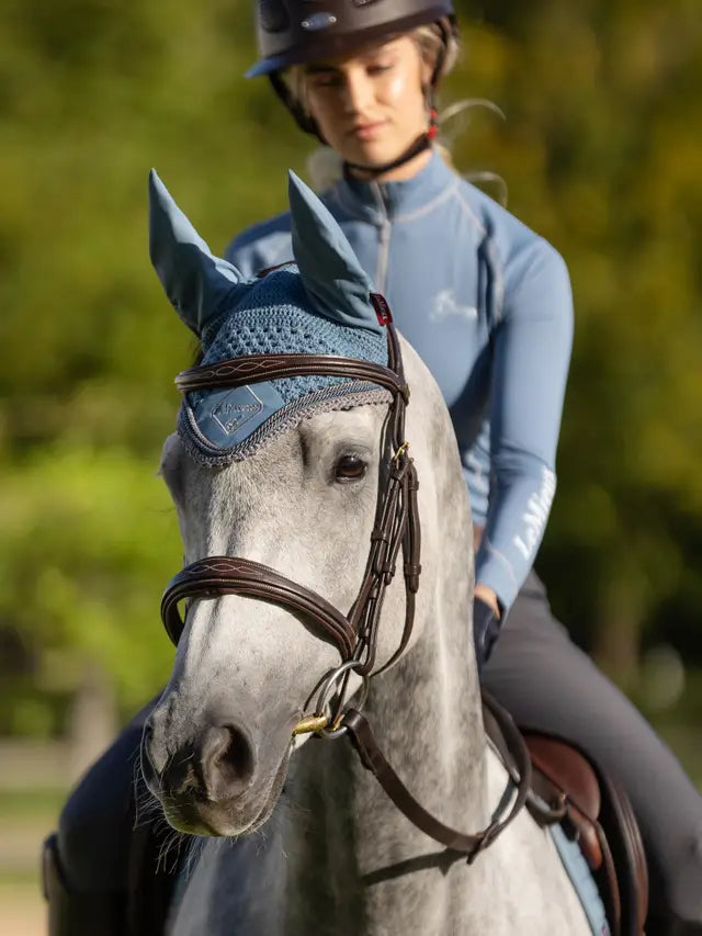 LeMieux Ice Blue Fly Hood on Grey Horse - Equestrian Ear Cover for Fly Protection | Equiflair