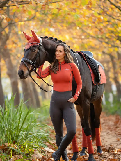 LeMieux Sienna Polo Bandages, Horse and Rider Matching Equestrian Outfit in Autumn Setting