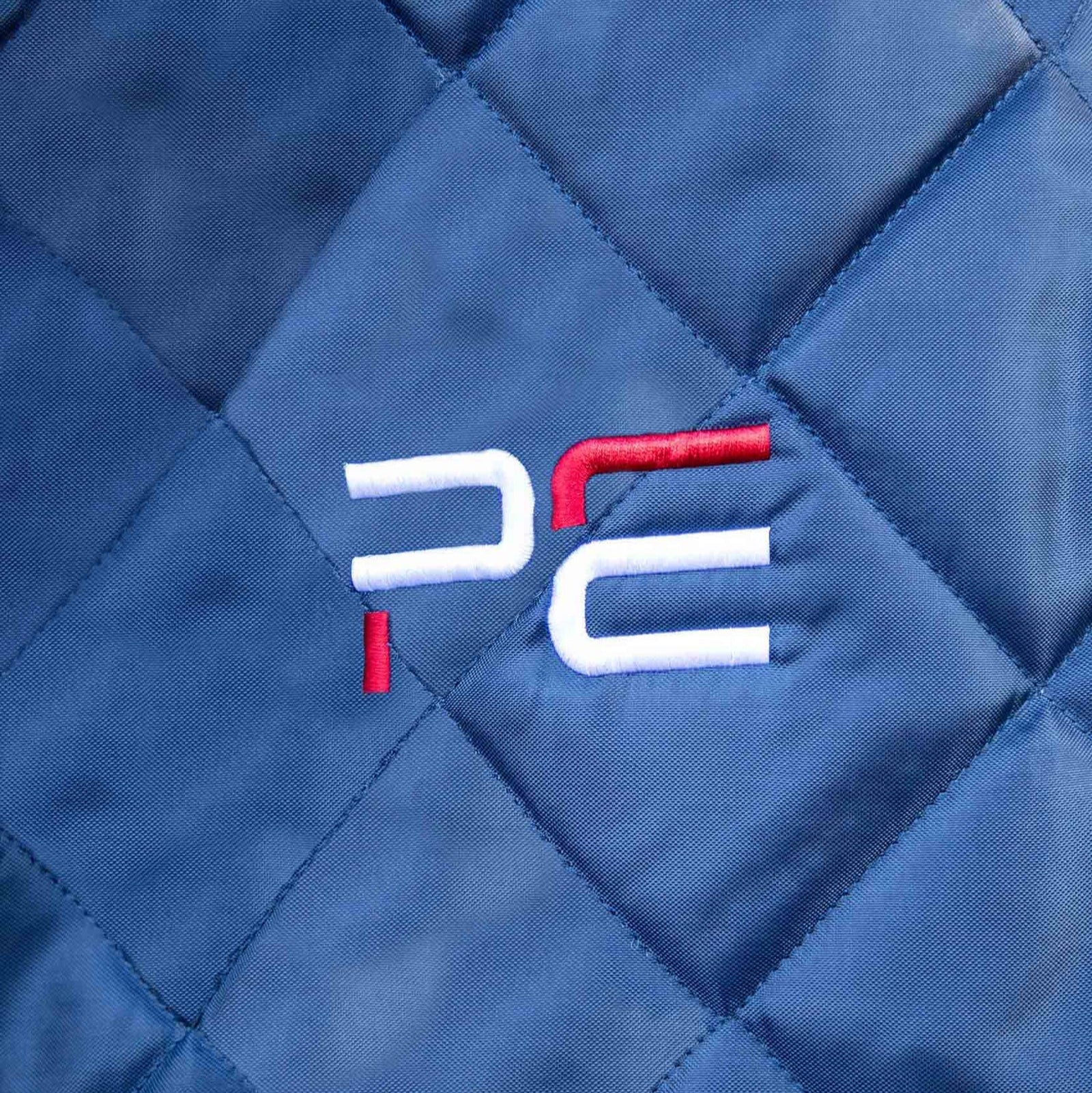 Premier Equine Tuscan Stable Rug 100g Navy Quilted Detail with PE Logo. Horse Stable Rug