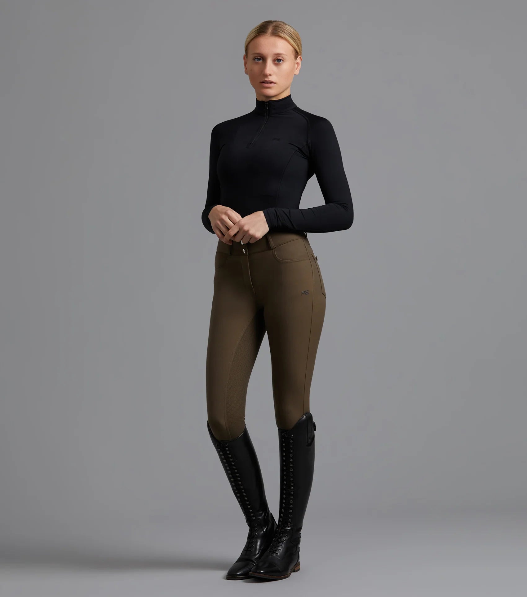 Premier Equine riding breeches, full seat gel, Dark Olive, ladies equestrian outfit, riding boots. Equiflair stockist.