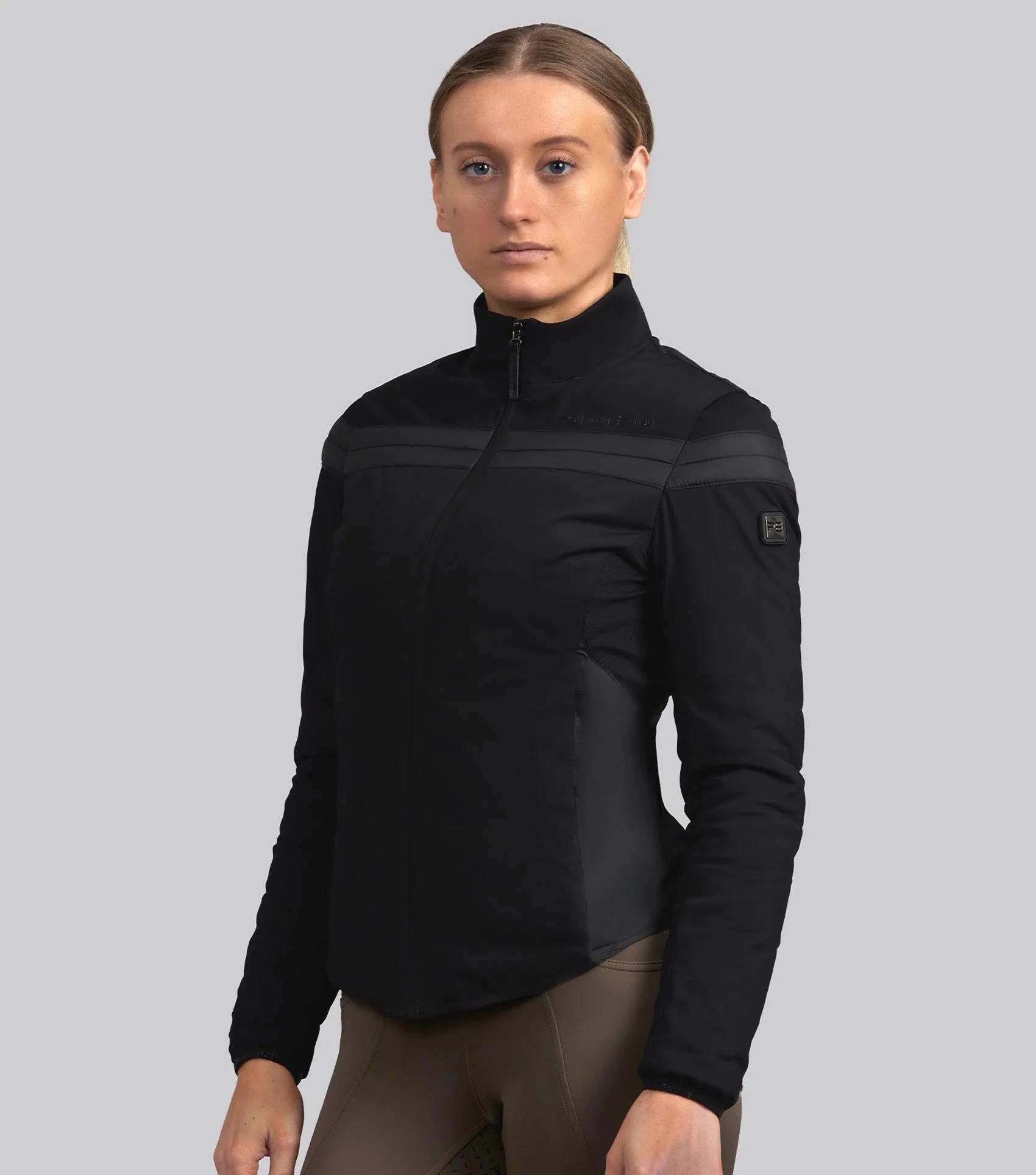 Premier Equine Vivace Ladies Training Jacket in Jet Black. Equestrian apparel, water-resistant, breathable.