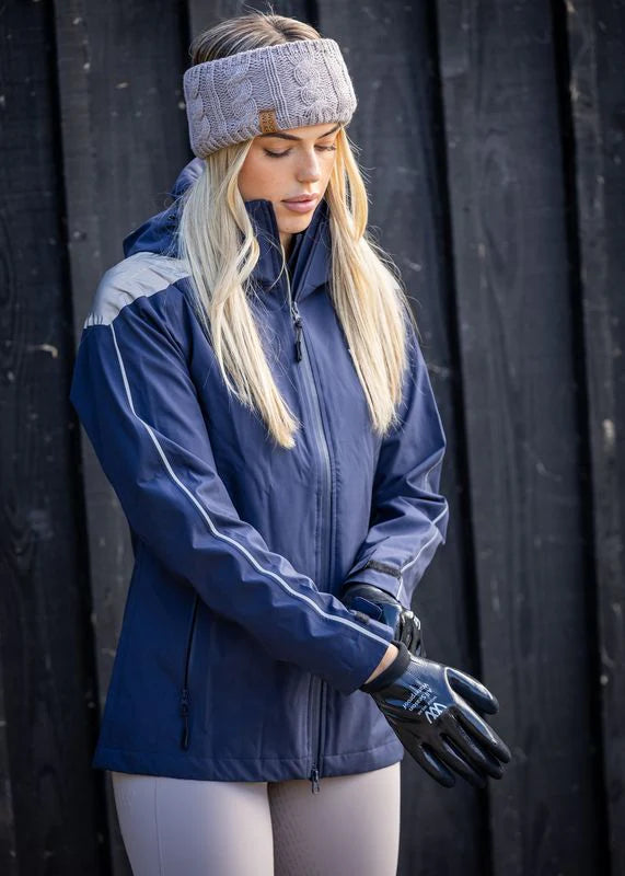 WOOF WEAR Waterproof Gloves: Woman in equestrian jacket wearing glossy black yard gloves. Stay dry & protected!